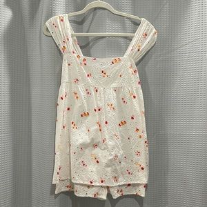 Baby doll romper from Urban Outfitters. White with small florals. Size small.